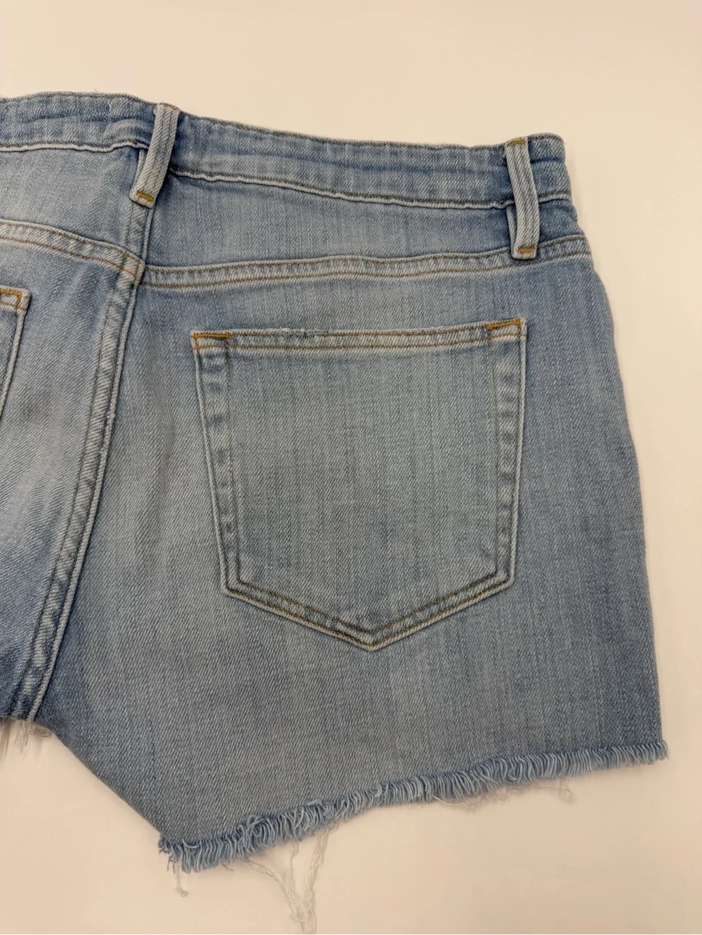Frame Denim Shredded Raw-Edge Denim Shorts in Hurrah 26